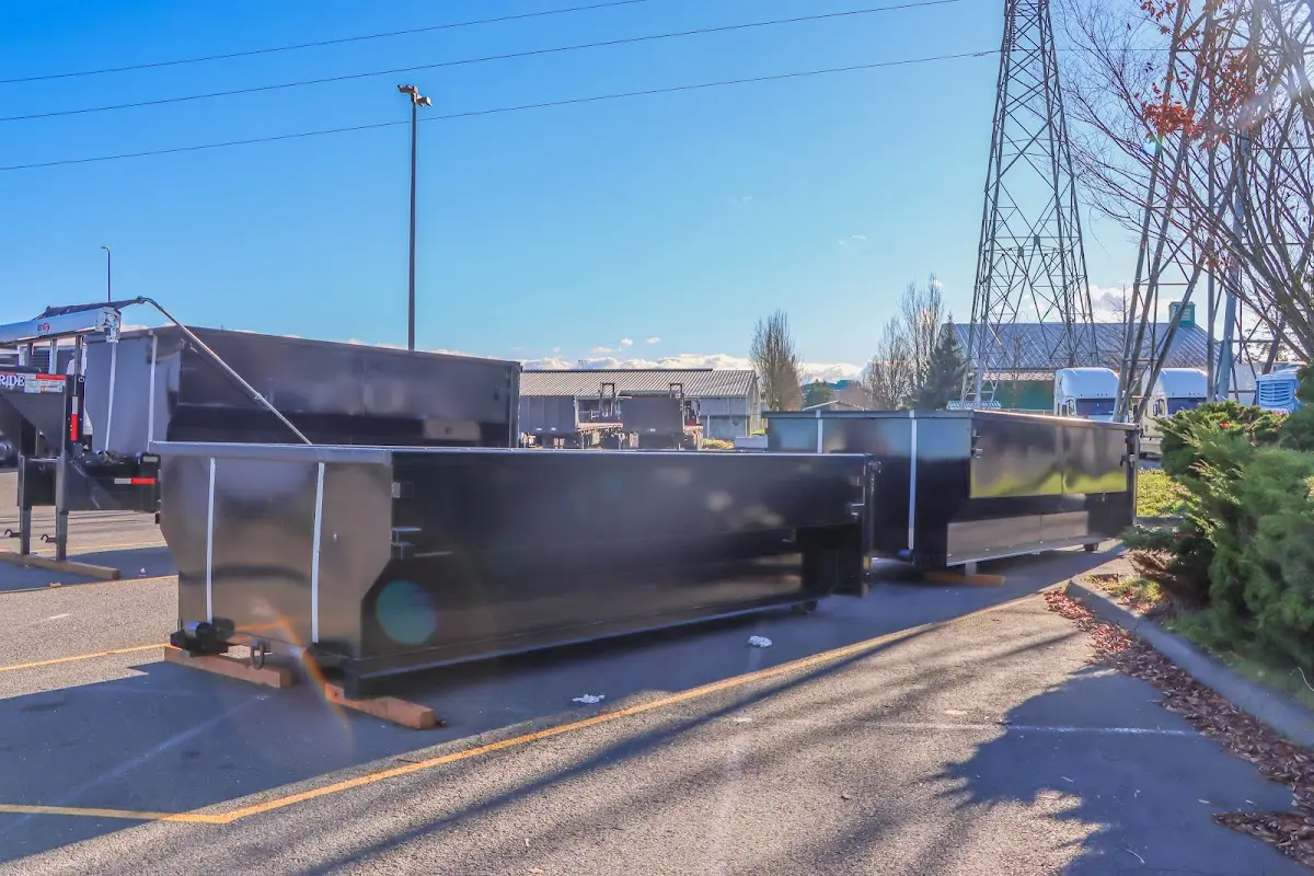 Roll-off dumpster ready for waste disposal at job site for 4 Yard Dumpster Rental in St. Ann